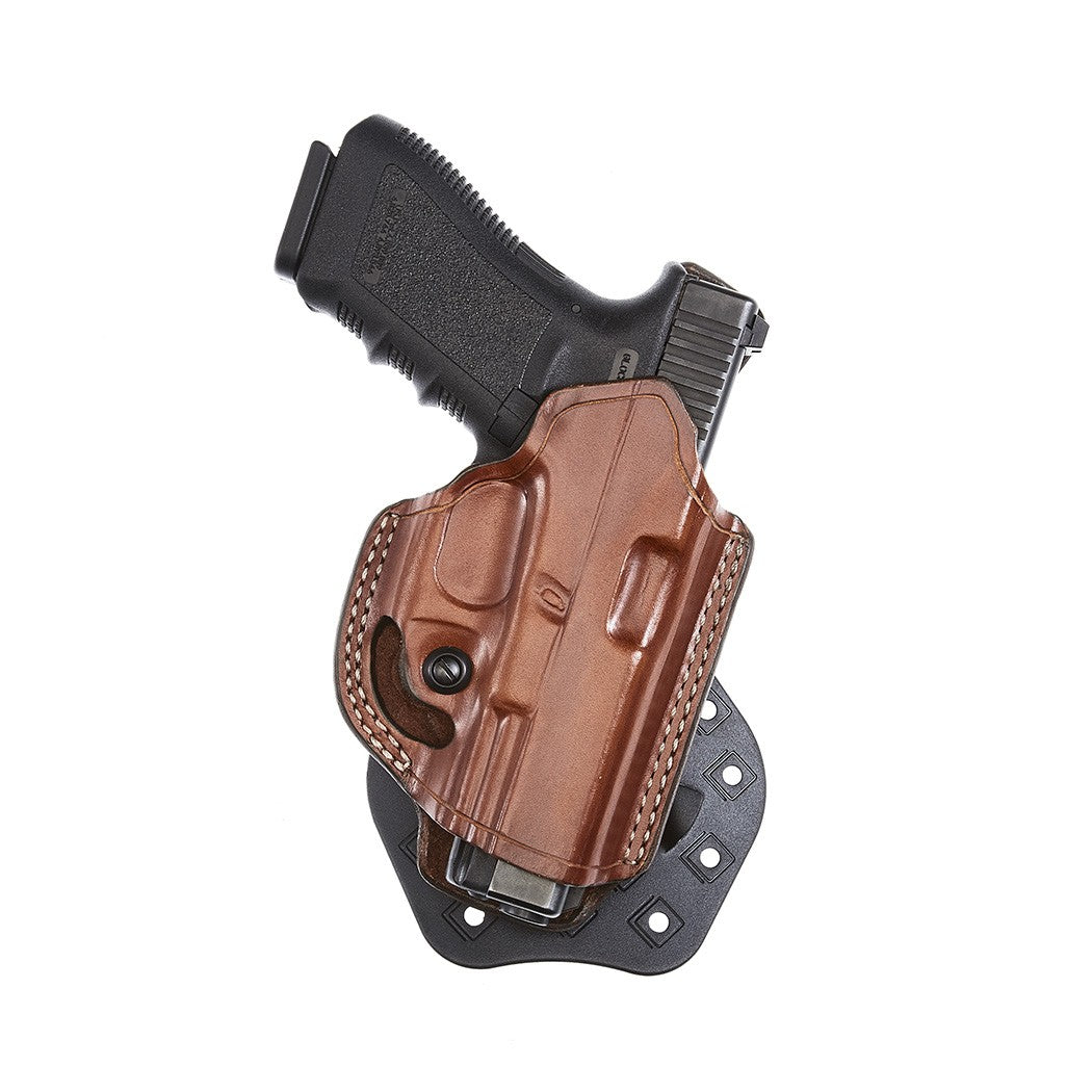 Aker Leather FlatSider XR19 Paddle Holster with handgun, featuring dual retention barbs for secure and comfortable carry.